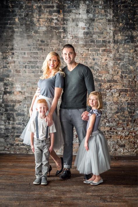 Family photos, gray tulle, mom and daughter tutus, neutral family photos, exposed brick wall Family Photos Gray Outfits, Family Photo Brick Wall, Family Pictures Brick Wall, Brick Wall Family Photoshoot, Gray Family Picture Outfits, Elegant Family Photoshoot, Family Photo Outfits Neutral, Neutral Family Photos, Fall Photo Outfits