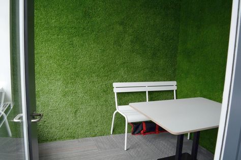 An office meeting room with astro turf walls; one of our chosen office design trends for 2019. Sports Themed Office, Turf Wall, Office Design Trends, Office Meeting Room, Office Fit Out, Astro Turf, Office Furniture Design, Office Meeting, Design Office