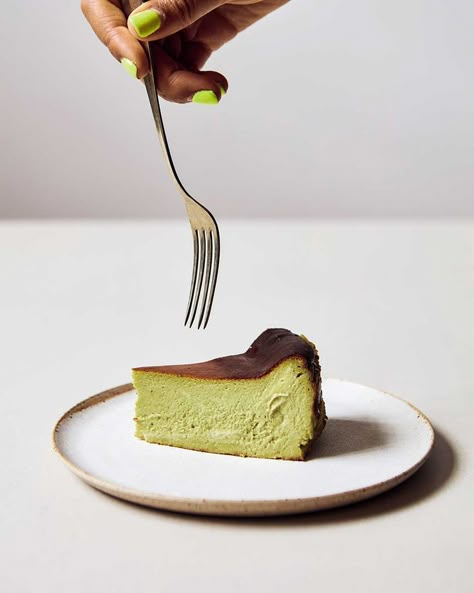 You cook this cheesecake at a high temperature so that the top burns. This, along with the matcha, adds a bitter note that offers both visual and flavour contrast to the dense creaminess underneath. It must be made the day before you want to eat it and left overnight in the fridge to set and chill (in fact, it peaks on day three): it’s the secret to the cheesecake’s dense allure. Burnt Cheesecake Packaging Ideas, Basque Cheesecake Recipe, Cheesecake Photography, Pickled Walnuts, Sweets Photography, Matcha Cheesecake, Basque Cheesecake, The Matcha, Food Photography Inspiration