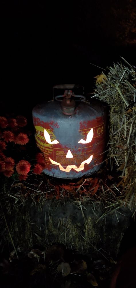 Weathered metal gasoline cans turned into extremely durable outdoor Halloween decor. Classic scary Jack O' Lantern faces cut into can with easy access ports for placing a candle or electric lighting. Looks great when added to your favorite Halloween displays! Prices vary by size and finish. Ranging from $30 - $75. Outdoor Halloween Decor, Jack O Lantern Faces, Face Cut, Halloween Displays, Metal Art Welded, Propane Tank, Outdoor Halloween, Halloween Outdoor Decorations, Propane