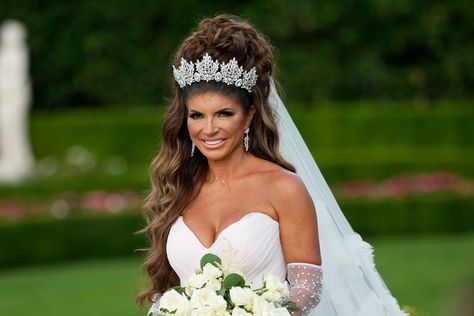 Relive RHONJ Teresa Giudice's Most Fabulous Hairstyles From dark curls to a $10,000 bridal updo, the RHONJ cast member has rocked so many incredible hair looks.  Talia Ergas Styling RHONJ Teresa Giudice's hair is never boring. Relive some of the best, including her $10,000 wedding hair, dark curls with bangs, blonde locks, and more. Season 13 Wedding Hair Dark, Rhonj Teresa, Curls With Bangs, Wedding Bangs, Teresa Guidice, Dark Curls, Bangs Updo, Blonde Locks, Teresa Giudice