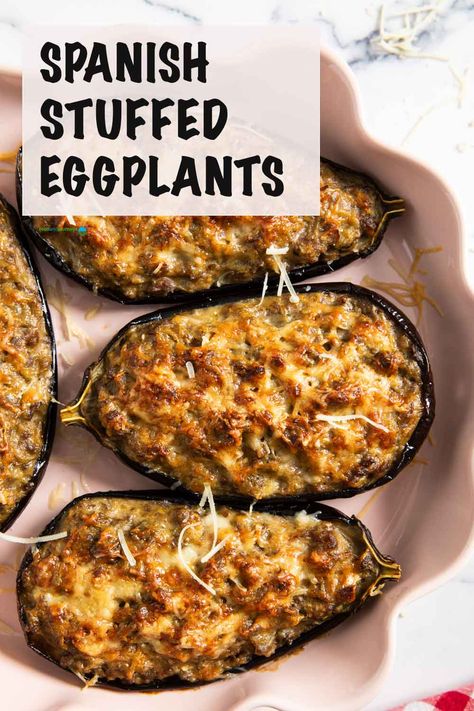 Spanish Stuffed Eggplants (Berenjenas Rellenas) combine the earthiness of roasted eggplants with the smokiness of Spanish spices in the ground meat.  Baked to golden perfection, they're a delicious and flavor-packed main course dish --- an undeniable complex mix of flavors in every bite! Stuffed Aubergine, Aubergine Recipe, Main Course Dishes, Spanish Cuisine, Eggplant Recipes, Ground Meat, Turkish Recipes, Food Platters, Ground Pork