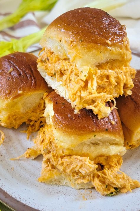 These quick and easy Buffalo Chicken Sliders are a great family friendly dinner recipe. Using Hawaiian rolls and shredded chicken this recipe for Chicken Bacon Ranch Sliders is easy to make and perfect for any party or dinner. The perfect chicken sliders for game day and Super Bowl. This quick and easy chicken sliders recipe is simple to make . The best Buffalo Chicken Sliders.  www.casualfoodist.com Chicken Thigh Sliders, Chicken Ranch Sliders, Easy Buffalo Chicken Sliders, Easy Chicken Sliders, Chicken Bacon Ranch Sliders, Bacon Ranch Sliders, Ranch Sliders, Sliders Recipes Chicken, Buffalo Chicken Sliders