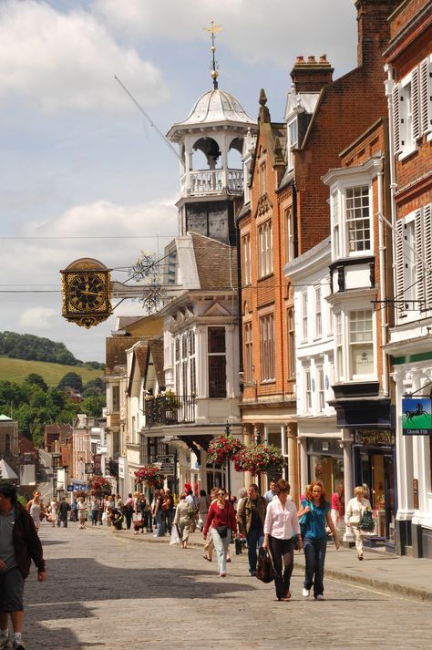 Iconic Guildford high street on a sunny market day, with the Hog's Back in the distance. Our home town Portland House, Guildford Surrey, Market Day, Town House, Condo Rental, Vacation Homes, Happy Places, Places To See, Vacation Home