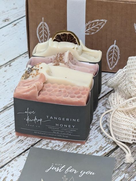 Give the gift of self-care and handmade goodness! Our handcrafted 4 Soap Bar + Bath Pouf Natural Soap Gift Box will make the perfect gift for Mom, Grandmother, Sister, Teacher, Babysitter, Co-Worker and Best Friend. Great for a Hostess Gift and Bridal Shower and Thank You gift. Our 4 Soap Bar + Bath Pouf Natural Soap Gift Set includes: -1 TANGERINE HONEY COCONUT MILK SOAP - 5 oz. - scented in a refreshing essential oil blend of tangerine, litsea cubeba and cedarwood. This seasonal summer soap co Summer Soap, Soap Making Tutorials, Cold Process Soap Designs, Soap Photography, Hand Made Soap, Dessert Soap, Citrus Soap, Coconut Milk Soap, Handmade Soap Recipes