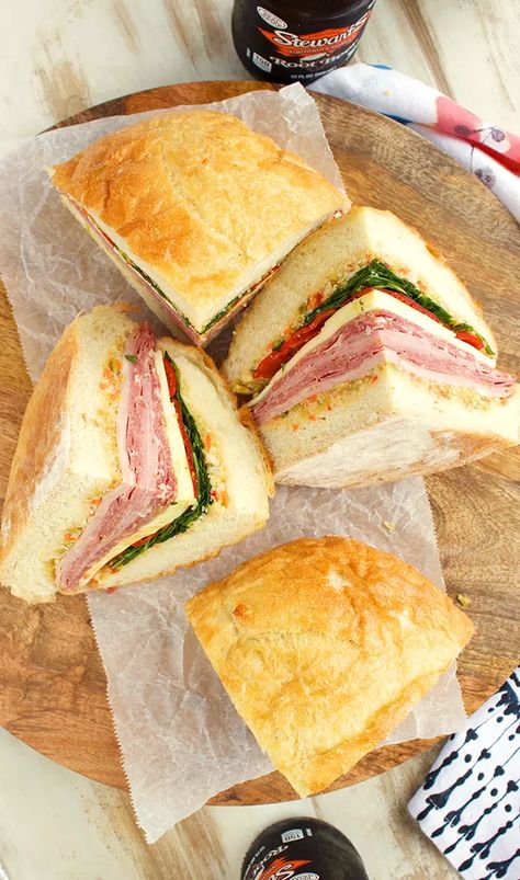 Classic Muffuletta Sandwich Recipe - The Suburban Soapbox Cuban Sandwich Recipes, Muffaletta Recipe, Muffuletta Recipe, Cuban Sandwich Recipe, Muffuletta Sandwich, Pressed Sandwich, New Orleans Recipes, Jo Cooks, Recipes Sandwiches