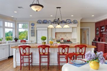 There's something about decorating with red, white, and blue for summer that is refreshing. And our patriotic holidays give us an extra excuse, too. Red Dining Chairs, Beach Style Kitchen, Red Bar Stools, Decorating Above Kitchen Cabinets, Red Chairs, Red And White Kitchen, Yellow Kitchen Decor, Colorful Kitchen Decor, Red Kitchen Decor