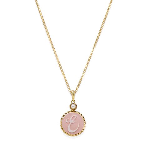 Part of the new Cameo Initials collection by Vintouch, this necklace is strung with an hand-carved cameo set in 24-karat gold vermeil and enriched with a dainty freshwater pearl that adds a touch of elegance. Wear yours solo or layered with other styles for a major impact. Presented in complimentary Vintouch gift box. Cast from 24-karat gold over Sterling Silver. (2. 5 Micron thickness). To protect gold-plating from natural oxidation, a 0. 10-micron palladium plate is applied before the gold-pla E Necklace Letter, E Necklace, Italy Necklace, Xmas Wishlist, Jewelry Accessories Ideas, Italian Jewelry, Pretty Jewelry, Monogram Necklace, Accessories Ideas