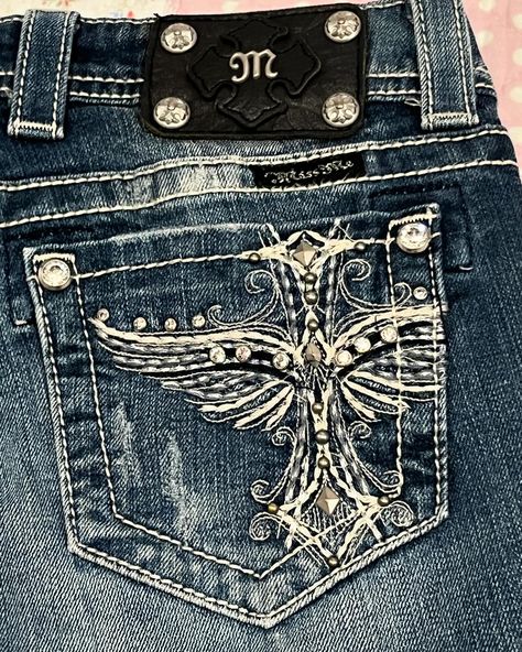 ⋆. 𐙚 ˚ authentic angel wing miss mes ୨ৎ ᡣ𐭩 vintage distressed denim 25 miss me jeans straight cut leg low rise fit, detailed with rhinestone & angel wing embroidery. ᡣ𐭩 like new vintage condition ᡣ𐭩 size M ( waist approx 38-40inc ) asking price: $130 Wing Embroidery, Angel Jeans, Miss Mes, Xmas Wishlist, Angels Jeans, Cozy Outfit, Miss Me Jeans, 2000s Fashion, Christmas Wishlist