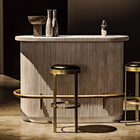 Noir Furniture on Instagram: "Our New Collin James Bar offers many possibilities for placement and creative use. Make it your own destination: Candy Bar, Nail Bar, Spa Bar, Juice Bar, Tequila tasting Bar, Reception Desk, stand up workstation by day.... Beautiful reeding wraps around the body and counter edge combined with our White Wash finish which offers a subtle reveal of the wood. Details include two under counter drawers, one adjustable shelf, and an antique brass finish foot rail. Availabl Bar Reception Desk, Stand Up Workstation, Bar Reception, Counter Edges, Juice Bar Design, Kitchen Bar Counter, Tequila Tasting, Kitchen Bar Design, Spa Bar