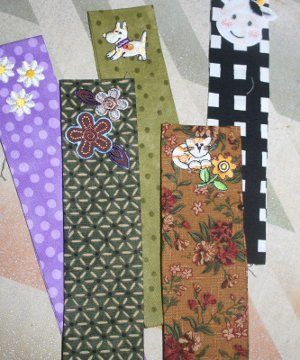 Wondering what to do with leftover fabric scraps? Turn them into these No Sew Fabric Bookmarks! These are great for handmade teacher gifts or stocking stuffers for book worms. Fabric Bookmarks, Handmade Teacher Gifts, Necktie Crafts, Braided Rug Diy, Old Ties, Knitting Amigurumi, Fabric Crafts Diy, Tie Crafts, Diy Bookmarks