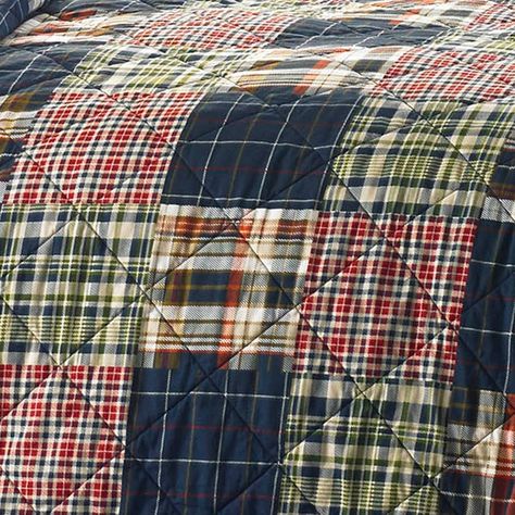 Upgrade your bedding with the Eddie Bauer Madrona plaid, a traditional and timeless design. Handsomely crafted multi-colored patchwork with predominant shades of blues, reds and greens are grounded with neutrals. Modern white and navy grid print is featured on the reverse. Made from 100% cotton, the quilt set is breathable and long lasting. Pre-washed for extra softness. Filled with a blend of 80% cotton and 20% polyester, Eddie Bauer quilts are lightweight but warm. Shams are included to round Homespun Quilts, Cabin Bedding, Plaid Quilts, Boys Quilt Patterns, Jersey Quilt, Quilt Stories, Shirt Quilts, Cotton Quilt Set, Memory Quilts