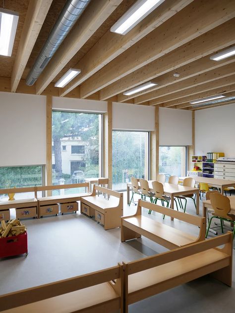 NAS architecture inserts wooden extension to old nursery school in france Modular School Architecture, Wooden Extension, Classroom Architecture, Indoor Courtyard, Building Extension, Wood School, Wooden Beams Ceiling, School Entrance, Timber Architecture