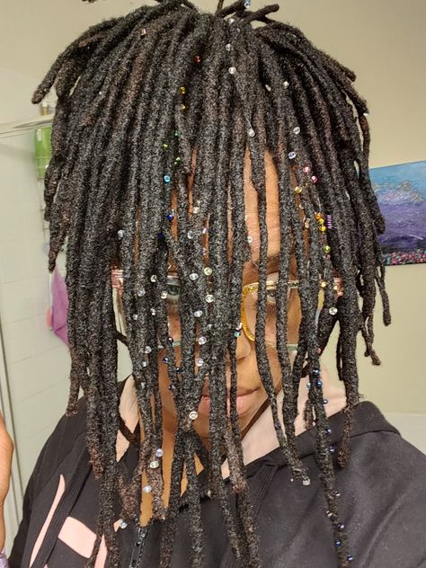 Locs with glass beads and metal charms Sparkle Locs, Sprinkle Locs, Loc Sprinkles Locks, Future Dreads, Loc Sprinkles, Loc Goals, Pretty Locs, Sprinkle Sprinkle, Mama Hair