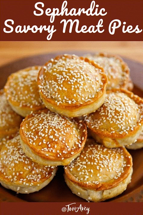 Tilly's Pastelles - A Sephardic recipe from Greg Henry's cookbook, Savory Pies - Meat hand pies with egg, parsley, and herbs sprinkled with sesame seeds. | ToriAvey.com #pastelles #sephardicrecipe #sephardic #savorypie #meatpie #handpie #savorypie #Kosher #holidayrecipe #hanukkah #chanukah #TorisKitchen Sephardic Jewish Recipes, Jewish Deli Recipes, Egyptian Meat Pie, Borekas Recipe, Sephardic Jewish Food, Savory Baking Ideas, Meat Hand Pies Recipes, Savory Pies Meat, Hand Pies Recipes Savory