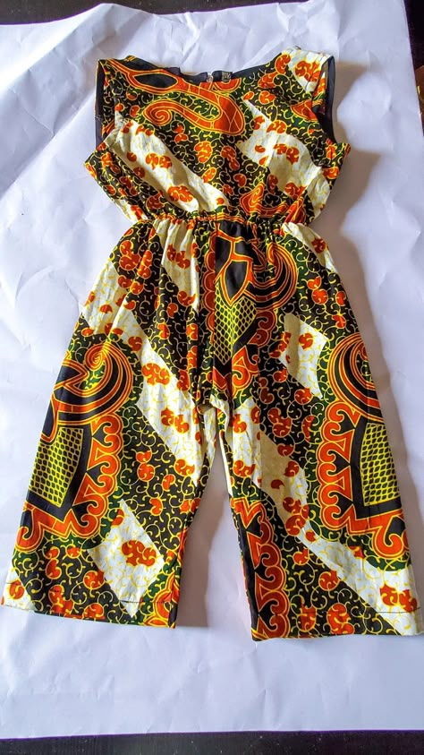 Ankara Jumpsuit For Kids, Children's Ankara Outfits, Baby Ankara Style Girl, Children's Style Ankara, Children Style Girl Ankara, Ankara Jumpsuit Styles, Baby African Clothes Jumpsuits & Rompers, African Kids Clothes, Trousers For Girls