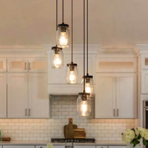 Gracie Oaks Carlile 5 - Light Cluster Jar Pendant | Wayfair Light Fixtures Kitchen Sink, Farmhouse Lighting Fixtures, Rustic Farmhouse Light Fixtures, Farmhouse Style Lighting Fixtures, Trailer House, Farmhouse Style Lighting, Mason Jar Kitchen, Mason Jar Chandelier, Wood Canopy