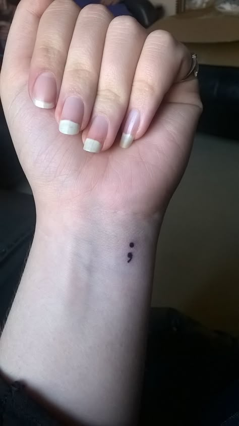 Semi-colon Tattoo Side Wrist, Small Tattoo Ideas Semi Colon, Fine Line Tattoo Semi Colon, Semi-colon Tattoo For Loved One, Stick And Poke Tattoo Semi Colon, Semi Collen Tattoo Ideas, Small Semicolon Tattoo Wrist, Small Semi Colon Wrist Tattoo, Tattoo Ideas That Have Meaning