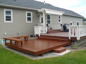 Living Large: THE NEW DECK L Shaped Deck, Deck Bench, L Shaped Bench, L Shaped House, Stairs Ideas, Concrete Footings, Deck Stairs, Deck Projects, Deck With Pergola