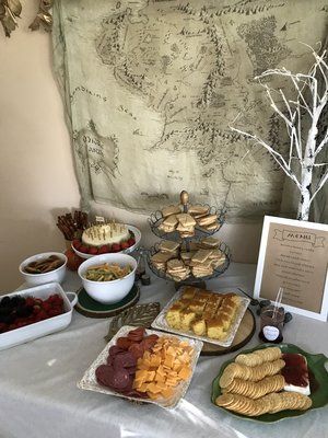 Tea with Tolkien Hobbit Party 2018 | Decor & Food | Menu Ideas Hobbit Themed Snacks, Hobbit Luncheon, Hobbit Menu Sign, 2nd Breakfast Hobbit Birthday, Hobbit Coming Of Age Party, Hobbit Food, Birthday Breakfast Party, Hobbit Party, Tolkien Hobbit