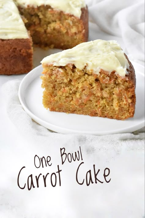 Slice of carrot cake on plate in front of whole cake. One Bowl Carrot Cake Recipe, One Bowl Carrot Cake, Simple Carrot Cake, Small Batch Carrot Cake, Small Carrot Cake Recipe, Small Carrot Cake, Carrot Cake Dessert, Carrot Cake Recipe Homemade, Carrot Cake Recipe Healthy