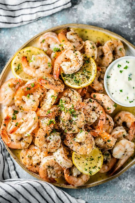 PIN THIS TO SAVE IT FOR LATER! Garlic Butter Baked Shrimp are the best easy shrimp appetizer for a party! They are easy to prep ahead of time and cook in only 5 minutes. Serve them with a simple garlic lemon mayo. They're delicious! #theendlessmeal #shrimp #prawns #shrimpappetizer #garlicbutter #christmas #holidayappetizers #appetizers #appetizerrecipes #prawnappetizer #bakedshrimp #bakedprawns #seafood #paleo #glutenfree #lowcarb #keto #ketoappetizer #ketoshrimp Garlic Shrimp Appetizer, Prawns Appetizers, Party Shrimp, Shrimp Appetizers Easy, Shrimp Appetizer Recipes, Baked Shrimp Recipes, Shrimp Appetizer, Shell Fish, Hot Appetizers