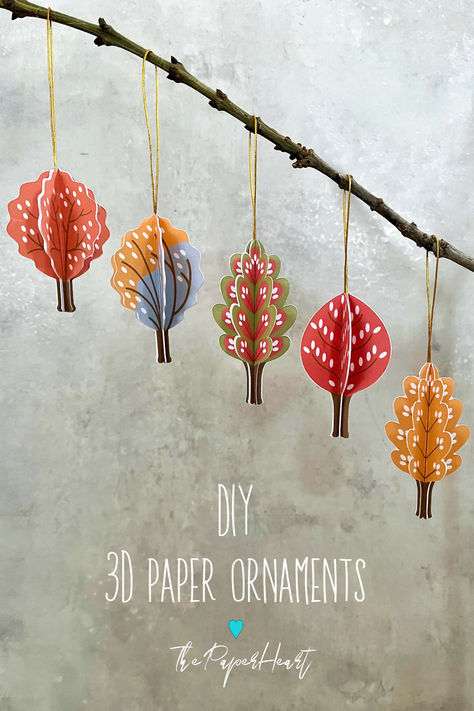 5 hanging 3D tree ornaments in orange, yellow, gray, red and green Paper Christmas Crafts, 3d Ornaments, Paper Trees, Cardboard Christmas, 3d Crafts, Christmas Branches, Paper Christmas Ornaments, 3d Tree, Paper Decoration