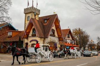 51 Best Christmas Towns in the USA 2023 — Best Christmas Towns Michigan Christmas, Christmas Towns, Frankenmuth Michigan, Santa Statues, Mackinaw City, Scenic Railroads, Christmas Town, Winter Getaway, Holiday Market