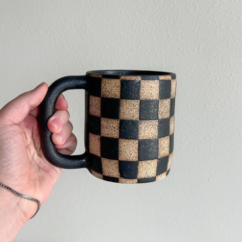 I don’t make these often because they’re time-consuming, but I always love the result! I use electric tape and an x-acto knife to make the checkered patten. 🏁 #mugshotmondays • • #pottery #potterymichigan #michiganpotters #potteylove #potteryinspo #checkeredmugs #etsysellers #etsy #etsygifts #handmadeindetroit #potterybyariel #coffeemug #handmademug Checkered Mug, Mug Pottery, Detroit Michigan, Mug Shots, Made Goods, Ariel, Stoneware, Etsy Gifts, Etsy Seller