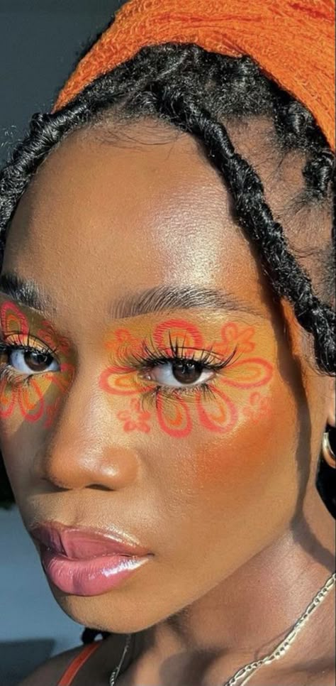 Orange Rave Makeup Looks, Orange Flower Makeup, Orange Graphic Liner, Graphic Liner Hooded Eyes, Graphic Eyeliner For Hooded Eyes, Flower Afro, Tape Makeup, Radiant Makeup, Portrait Studies