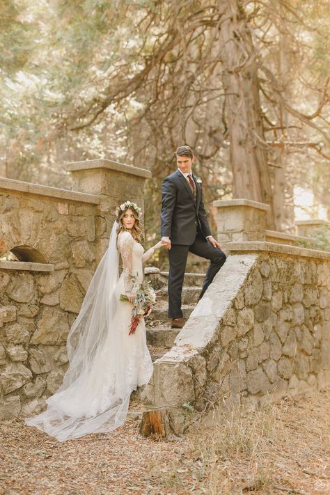 Fairytale wedding in the forest in Lake Arrowhead, California. Bride and groom walking up stone steps of castle ruin in the forest.   #castle #forestwedding #woodsywedding #lakearrowhead Castle Engagement Photoshoot, Runaway Couple, Wedding Ruins, Engaged Photoshoot, Castle Wedding Dress, Forest Castle, Wedding In The Forest, Lake Arrowhead California, Wedding Scotland