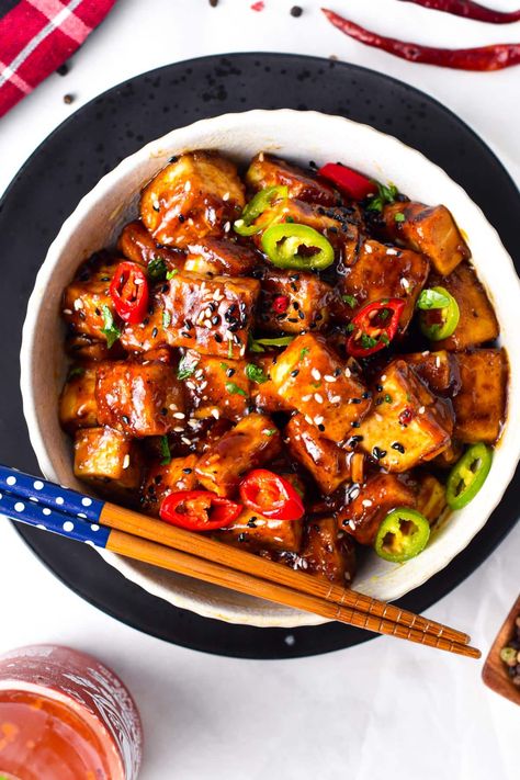 This Szechuan Tofu will fix your spicy Chinese food craving! Delicious crispy tofu pieces coated with a spicy Sichuan sauce packed with garlic, chili pepper, and Schezuan pepper. Szechuan Tofu, Sichuan Sauce, Conscious Plant Kitchen, Tofu Sauce, Chinese Cooking Wine, Hot Spices, Plant Kitchen, Tofu Stir Fry, Tofu Recipe