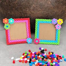 Crafts with a pegboard and fuse beads. Fun crafts for kids! Fuse Bead Wall Art, Peeler Bead Bookmark, Perler Bead Frame, Perler Bead Picture Frames, Perler Bead Projects, Perler Bead Crafts, Creative Crafts For Kids, Beads Craft Kids, Perler Beads Ideas