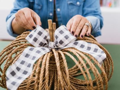 How to Paint Mudcloth-Inspired Pumpkins | Holiday Decorating and Entertaining Ideas & How-Tos | HGTV How To Make Pumpkins, Homemade Fall Decor, Rope Pumpkins, Twine Pumpkins, Pumkin Decoration, Pumpkins Diy, Fall Pumpkin Centerpieces, Fall Pumpkin Crafts, Pumpkin Centerpiece