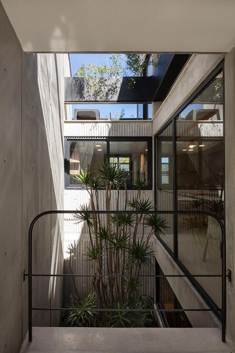 corrugated concrete towers + verdant patios form student housing by a-001 in mexico Modern Student Housing, Student Housing Architecture, Corrugated Concrete, Vertical House, Student Residence, Houses In Mexico, Student Housing, Minimal House Design, Student House