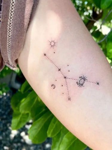 19 Alluring Forearm Tattoo Ideas for Women Cancerian Tattoo Dainty, Zodiac Tattoos Cancerian, Cancerian Star Sign Tattoo, Tattoos For Cancers, Cancerian Tattoo For Women Constellation, Cancerian Constellation Tattoo, Constalation Stars Tatoos, Zodiac Tattoos For Cancers, Constellation Tattoo Sleeve