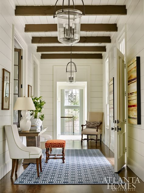 Inside a mountain retreat that’s equal parts sophisticated and cozy. Mudroom Entryway, Foyer Decorating, Atlanta Homes, Hallway Lighting, Entry Hall, Building A New Home, House Remodel, Entry Way, Mountain Home