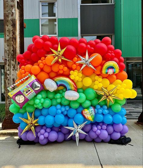 Balloon wall created for Pittsburgh Gay Pride parade/festival by Party on Butler located in Lawrenceville, PA. Red, orange, yellow, green, blue, purple balloons used along with various shapes of foil mylar balloons, such as a fun rainbow and a retro boombox, attached to wall. Pride Balloon Decorations, Rainbow Balloon Wall, Pride Balloons, Pride Decorations, Pride Ideas, Balloon Walls, Pride Party, Pride Event, Gay Pride Parade