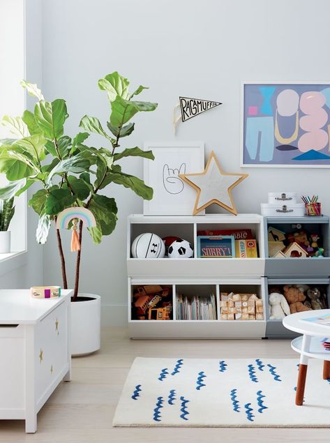 Between the toys, books, clothes and school supplies, it’s amazing that there’s any room in bedrooms or playrooms for kids. Luckily, it’s possible to handle all that stuff without breaking a sweat. Here are some of our favorite kids' storage ideas for those typically hard to organize areas. Small Kids Table, Toddler Play Table, Modern Kids Table, Star Mirror, Wooden Toy Boxes, Toddler Playroom, Toy Organizer, Shaped Mirror, Playroom Storage