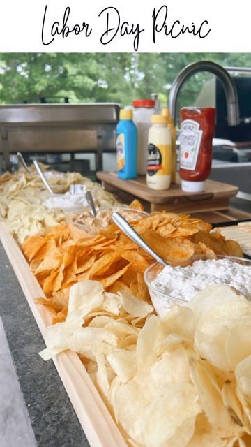 Jennifer Lunsford Brown | Knoxville Creator on Instagram: "Labor Day Picnic // Host a 🍔 burger Bar along side a huge Chip n’ Dip Board. I mean really, who doesn’t love chips and dip!?!? (Also - 👀my good lookin’ burger flipper!)   Serve up the following :  Slider buns Warmer full of burgers Variety of Cheeses Toppings: pickles, onions, lettuce, tomatoe Warmer toppings: Bacon, sautéed onions, sautéed mushrooms Sauces: mustard, ketchup, mayo, butter.   For the Chip n’ Dip board add a variety of chips and dips. I love shopping @samsclub  for their gourmet dips, ready to grill sliders, and slider buns!   #labordayweekend #laborday #labordaypicnic #picnic #cookout #burgerbar #chipanddip #chipsanddip #chipanddipbar #boards #snacks #gameday #tailgateparty #labordayfood" Bbq Chip Dip, How To Serve Chips And Dip At A Party, Chips And Dip Bar, Teds Montana Grill Chip Dip, Fourth Of July Chips And Dip, Dip For Lays Potato Chips, Gourmet Dips, Dip Board, Pickles Onions