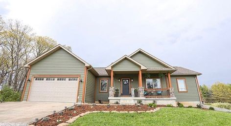 LP Building Solutions on Instagram: “The perfect earthy-home exterior. Raise your hand if you love cedar trim paired with olive green siding too! 🖐️ #LP #SmartSide #Siding…” Olive Green House Exterior White Trim, Sage Green Siding With Brick, Sage Green Siding House Exterior Colors, Green Siding Cedar Trim, Green Siding Brown Trim, Green And Cedar House Exterior, Light Green Wood House Exterior, Green House Exterior Brown Trim, Olive Green Farmhouse Exterior