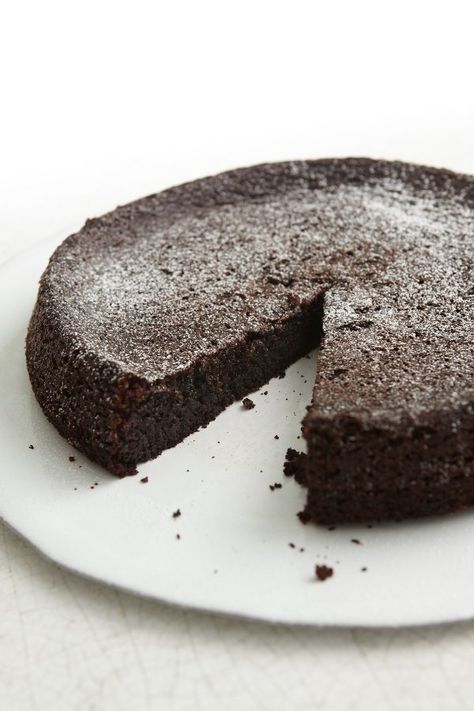 Chocolate Olive Oil Cake | Nigella's Recipes | Nigella Lawson Chocolate Olive Oil Cake, Olive Oil Cake Recipe, Chocolate Crumbs, Overnight Oat, Torte Cupcake, Oil Cake, Olive Oil Cake, Nigella Lawson, White Plate