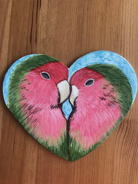 “Lovebirds” painting on heart shaped canvas board. $15. Painting On Heart Shaped Wood, Valentine Heart Canvas Painting Ideas, Small Heart Canvas Paintings, Mini Heart Canvas Painting, Acrylic Painting Hearts Canvases, Heart Shaped Painting Ideas, Wood Heart Painting Ideas, Painting On Heart Shaped Canvas, Painting Hearts On Canvas