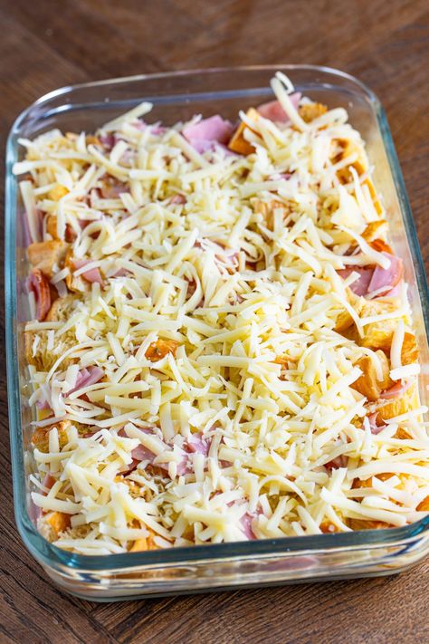 This recipe for Ham and Cheese Croissant Casserole is the perfect breakfast or brunch. A great way to use up leftover ham and stale croissants! Southern Living Ham And Cheese Croissant Casserole, Cheesy Ham And Gouda Croissant Casserole, Han And Cheese Croissant Bake, Ham Croissant Casserole, Ham And Croissant Bake, Ham And Cheese Croissant Breakfast Casserole, What To Make With Leftover Croissants, Leftover Croissants Recipes, What To Do With Leftover Croissants