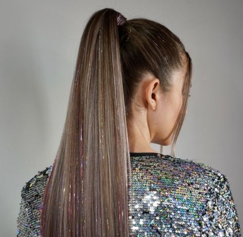 Attach tinsel using extension tape around hairline. Leave at least 1” of hair around hairline to cover the extension tape. Glitter Hairstyles, Ponytail Inspiration, Half Bun Hairstyle, Half Bun Hairstyles, Slicked Back Ponytail, Half Bun, Volumizing Spray, High Pony, Hair Tinsel