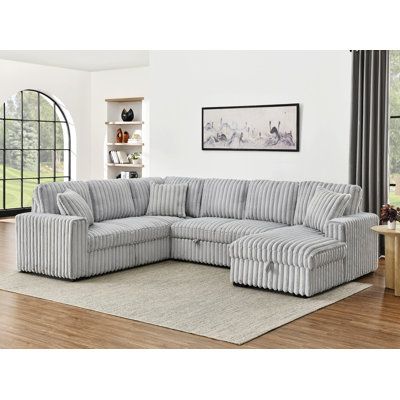 Experience unparalleled comfort and modern style with our Modular Sectional Sofa. Designed for versatile living spaces, this sofa features adjustable headrests and armrests for personalized comfort. Its modular design allows for various configurations, making it a perfect fit for any room. Fabric: Gray Polyester | Abrahams Contemporary L-Shaped Sectional w / Plush Seating & Modern Appeal, Polyester | Wayfair Pull Out Bed Couch, Living Room With Storage, Couches Living Room Comfy, Futuristic Living Room, Large Sectional Couch, Sectional Sofa Comfy, Room With Storage, Pullout Bed, Oversized Sectional Sofa