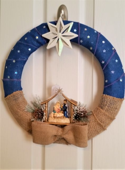 Nativity wreath with navy & natural burlap ribbon. Christmas Nativity Wreath, Wreath With Nativity Scene, Nativity Scene Wreath, Nativity Wreath Diy, Christmas Nativity Scene Diy, Nativity Wreath, Dollar Tree Easter Crafts, Nativity Scene Diy, Christmas Manger