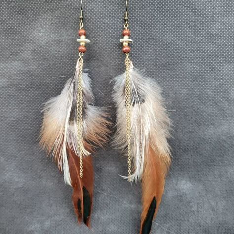 New Long Feather Earrings Shoulder Dusters My One Of A Kind Handcrafted Design Gold Tone Hardware Danty Chains, Charms,& Beads White & Brown Wood Beads White, Brown, Rust Tone Hen Feathers 7"Length Created Sept 2022 #Feather #Earrings #Handmade #Poshmark #Boho #Jewelry #Festival #Fall #Longearrings #Gypsy #Oneofakind Handmade Feather Earrings, Diy Feather Jewelry, Feather Earrings Outfit, Feather Dangle Earrings, Wooden Jewelry Handmade, Diy Feather Earrings, Boho Feather Earrings, Long Feather Earrings, Earrings With Feathers