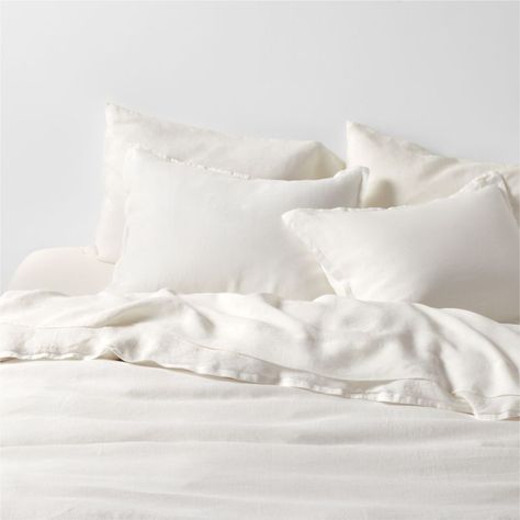 Our pure linen bedding creates a nighttime oasis. Woven of sustainable linen in ivory and finished with elegant-yet-casual flange tailoring, this airy and breathable chambray sham makes the bed with a dreamy, laid-back look. Our luxurious and durable linen pillow sham is a Crate & Barrel exclusive.Bed pillows also available.   • 100% EUROPEAN FLAX-certified linen  • Reverses to solid  • 2" flange tailoring  • Envelope closure  • Shams sold individually  • This item can be personalized with Pure Linen Bedding, Luxurious Bedding, Colorful Bedding, King Pillows, Bed Pillow, Linen Sheets, Stylish Bedroom, Linen Duvet Covers, Sofa Shop