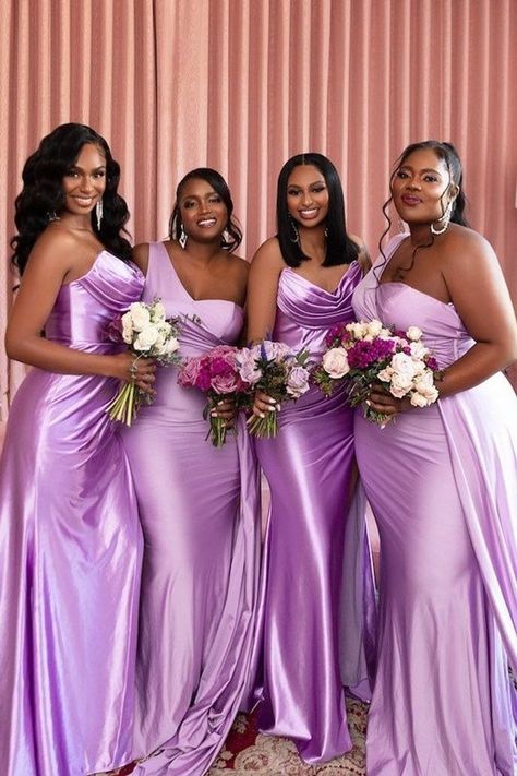 These bridesmaids are looking fierce in lavender! We love how this gorgeous one-shoulder silky dress looks on these beautiful women. Whether you have a spring wedding or a summer wedding, this shade of purple can't go wrong on your bridesmaids as they stand by your side. Plus, we only sell size inclusive bridesmaid dresses, so everyone can look their best. Tap to shop these gorgeous lavender bridesmaid dresses! Purple And Lavender Bridesmaid Dresses, Purple Color Bridesmaid Dresses, Bridesmaids Purple Dresses, Lilac Wedding Bridesmaid Dress, Purple Braidsmaids Dresses, Lilac Brides Made Dresses, Shades Of Purple Dresses, Braid Mades Dresses, Purple Dress Bridesmaid